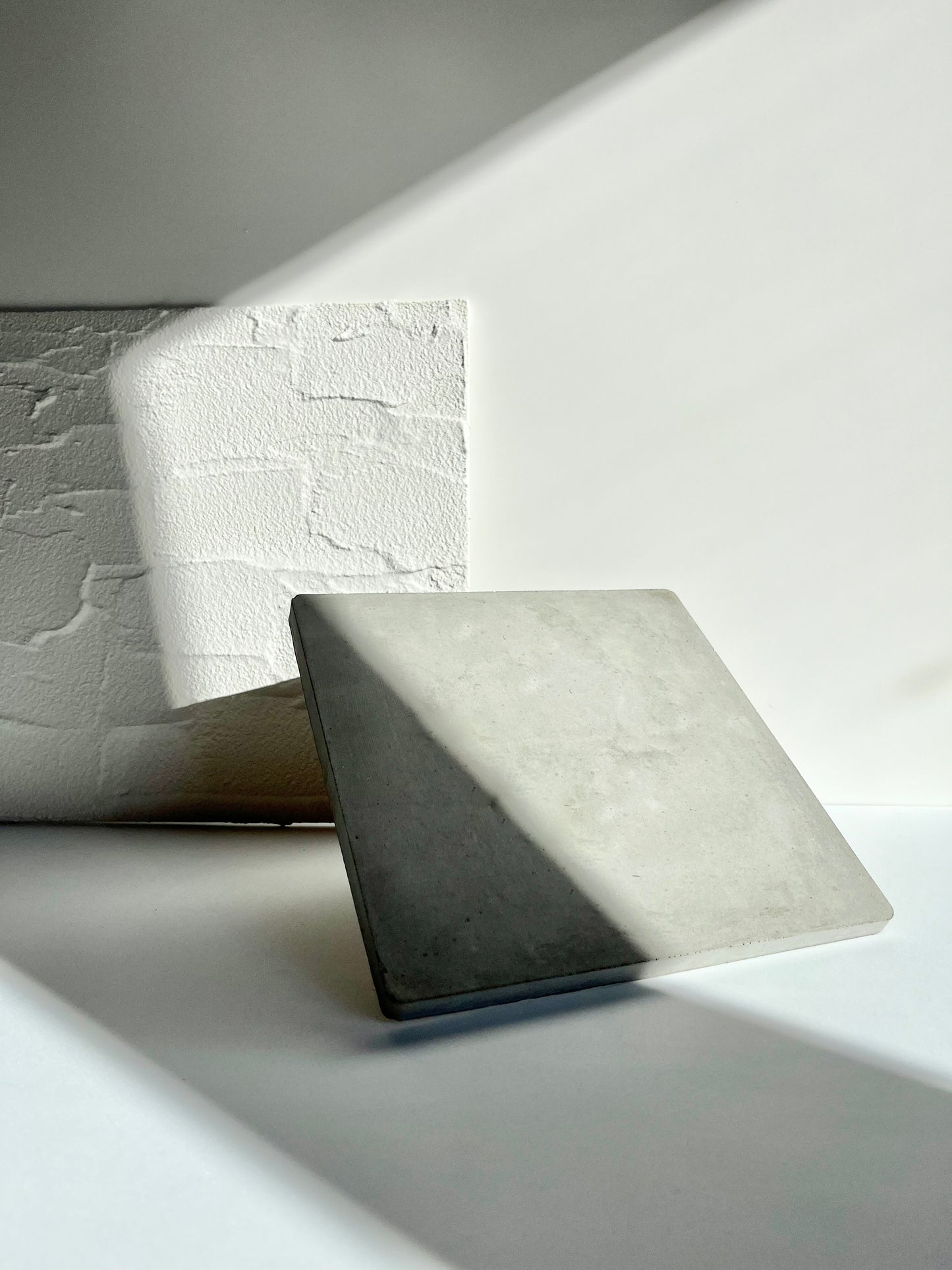 Dessous de plat carré minimaliste en béton